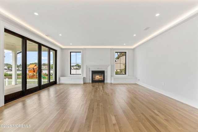 24 Baruch Dr, Long Branch, NJ 07740 - unfurnished living room with light wood-style flooring, a premium fireplace, and recessed lighting
