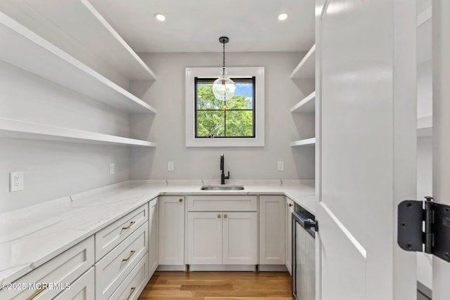 24 Baruch Dr, Long Branch, NJ 07740 - kitchen with open shelves, light stone countertops, light wood-style floors, hanging light fixtures, and recessed lighting