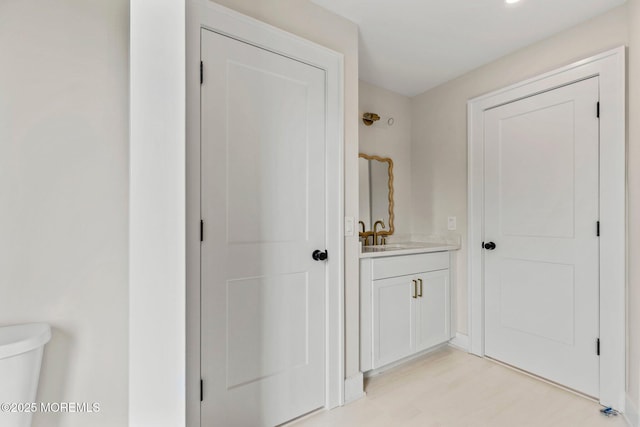 24 Baruch Dr, Long Branch, NJ 07740 - corridor featuring a sink