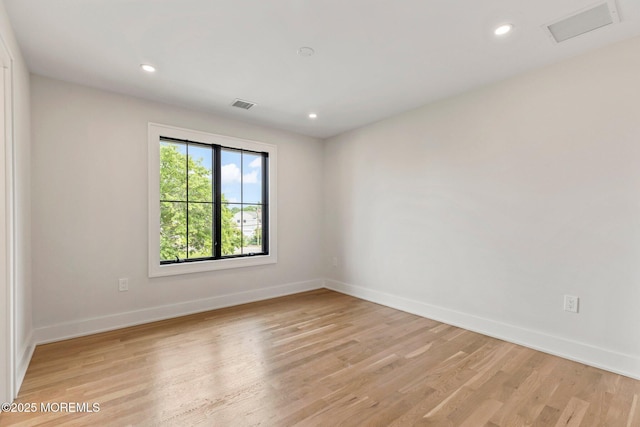 24 Baruch Dr, Long Branch, NJ 07740 - unfurnished room with light wood finished floors and recessed lighting