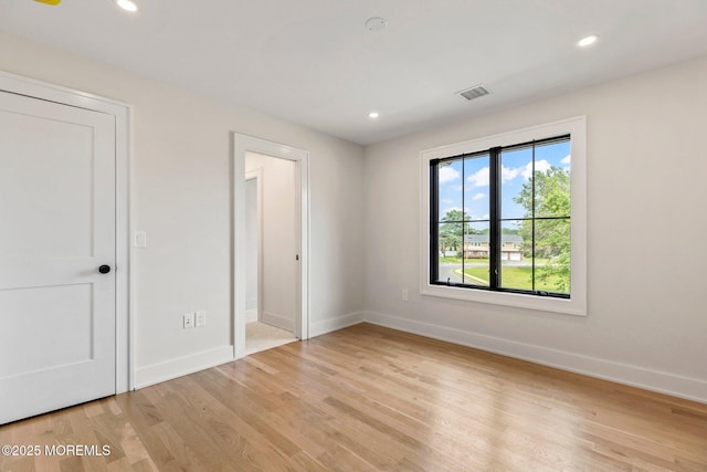 24 Baruch Dr, Long Branch, NJ 07740 - unfurnished bedroom with light wood-style floors and recessed lighting