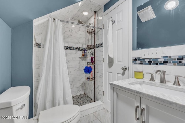 full bathroom featuring toilet, a shower stall, marble finish floor, and vanity