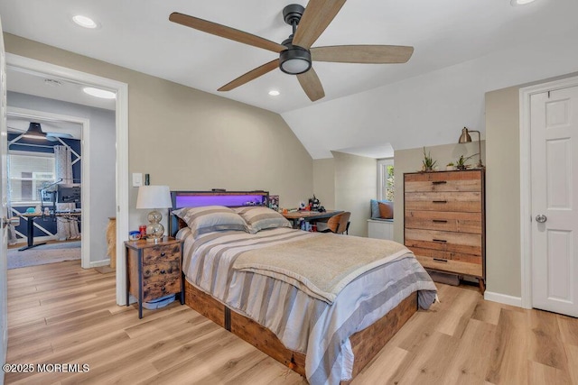 bedroom featuring recessed lighting, multiple windows, and light wood-type flooring
