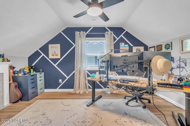 office area with plenty of natural light, ceiling fan, and wood finished floors
