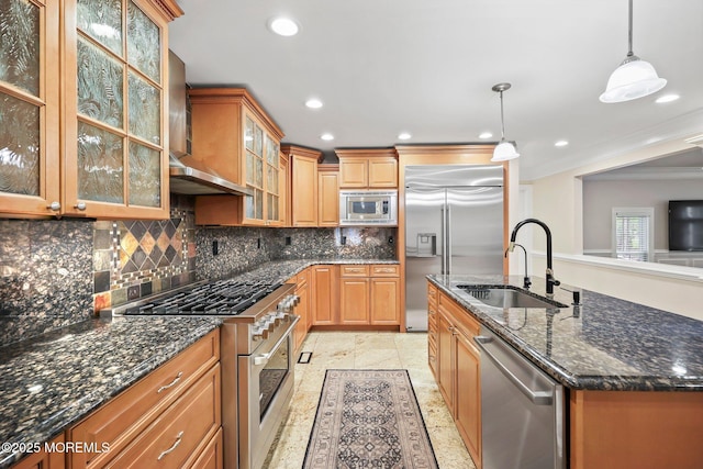 kitchen featuring built in appliances, a sink, ornamental molding, decorative backsplash, and recessed lighting