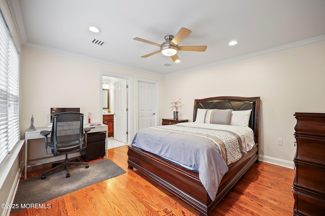 bedroom featuring wood finished floors, a desk, crown molding, recessed lighting, and a ceiling fan