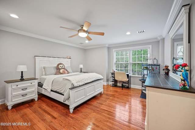 bedroom with light wood-style floors, ornamental molding, baseboards, recessed lighting, and a ceiling fan