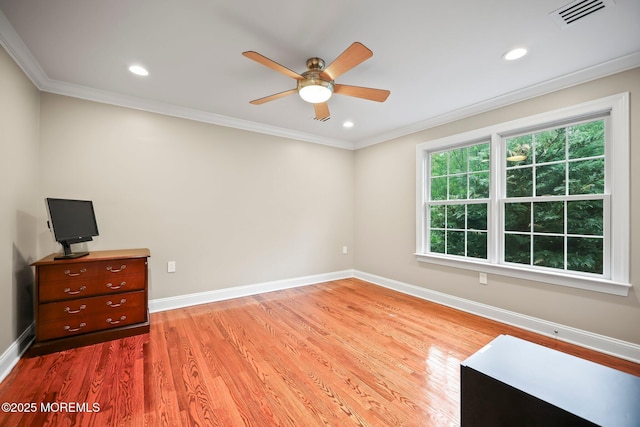 unfurnished room featuring a ceiling fan, wood finished floors, baseboards, ornamental molding, and recessed lighting