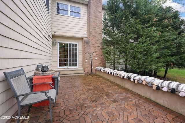 view of patio featuring outdoor dining area
