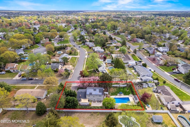 birds eye view of property with a residential view