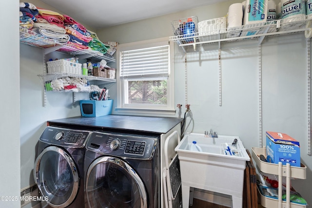 washroom with laundry area and separate washer and dryer