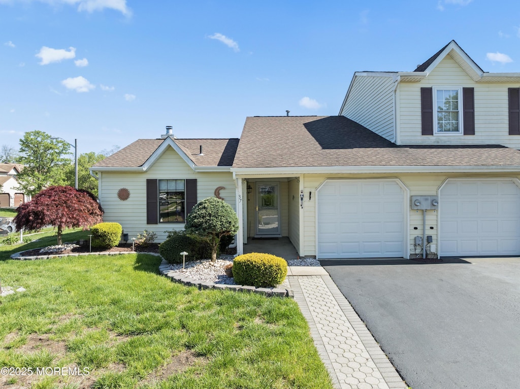37 Sloop Sq, Freehold, NJ 07728 - view of front of house with a front yard, aphalt driveway, and a shingled roof