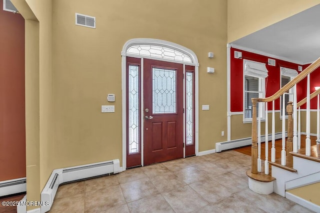 65 Pineoaka Rd, Jackson, NJ 08527 - foyer with visible vents, a towering ceiling, baseboards, tile patterned floors, and a baseboard radiator