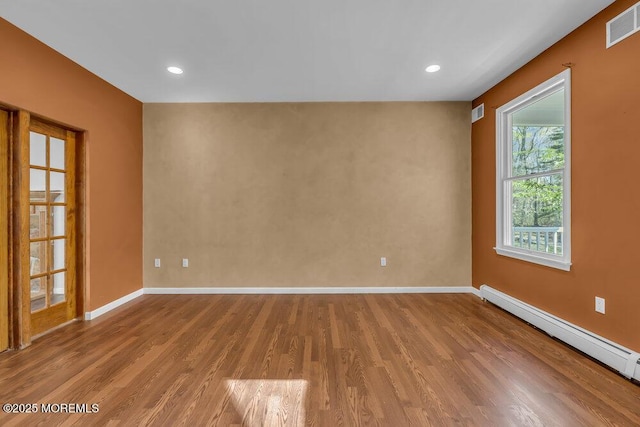 65 Pineoaka Rd, Jackson, NJ 08527 - unfurnished room with recessed lighting, baseboards, wood finished floors, a baseboard radiator, and visible vents