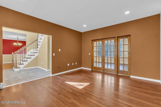 65 Pineoaka Rd, Jackson, NJ 08527 - unfurnished room featuring a chandelier, french doors, recessed lighting, baseboards, and wood finished floors