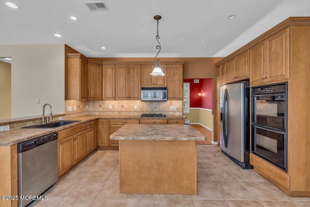 65 Pineoaka Rd, Jackson, NJ 08527 - kitchen with visible vents, a kitchen island, a sink, appliances with stainless steel finishes, and backsplash