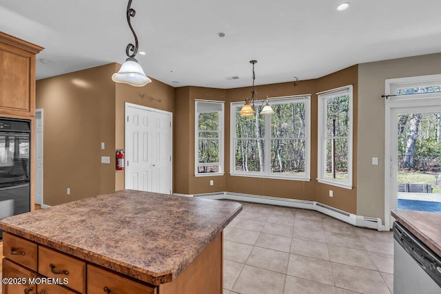65 Pineoaka Rd, Jackson, NJ 08527 - kitchen featuring dobule oven black, a center island, dishwasher, light tile patterned floors, and a baseboard heating unit