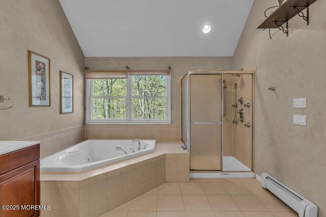 65 Pineoaka Rd, Jackson, NJ 08527 - full bathroom featuring tile patterned flooring, a baseboard radiator, vaulted ceiling, a bath, and a stall shower