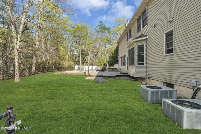 65 Pineoaka Rd, Jackson, NJ 08527 - view of yard featuring central air condition unit, a patio, and fence