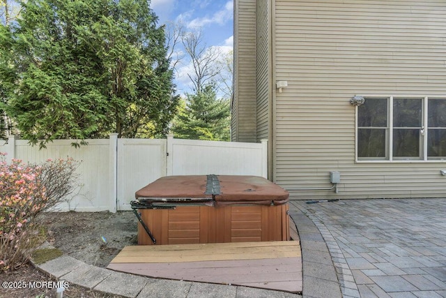 65 Pineoaka Rd, Jackson, NJ 08527 - view of patio featuring a hot tub and fence