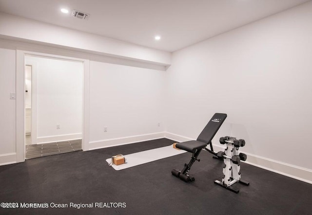 exercise room featuring recessed lighting, baseboards, and visible vents