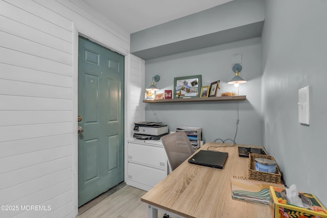 office with light wood-style floors