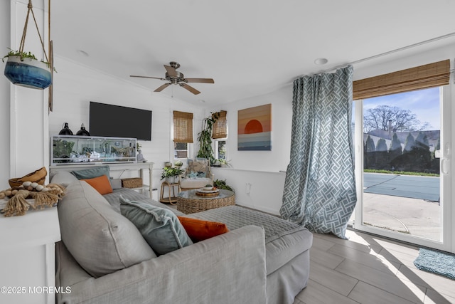 living area with ceiling fan