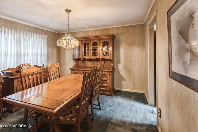 2174 Begonia Ave, Sea Girt, NJ 08750 - dining space featuring dark colored carpet, a chandelier, baseboards, and crown molding