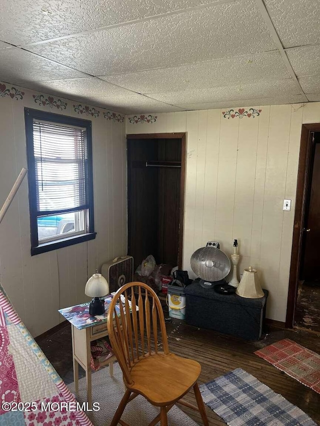 bedroom with wood finished floors