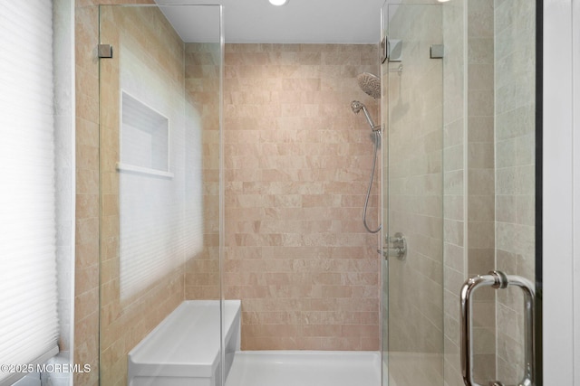 bathroom with a stall shower