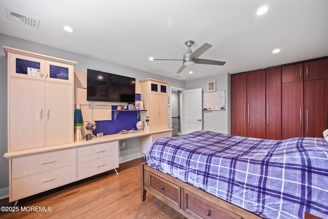 bedroom featuring a ceiling fan, recessed lighting, wood finished floors, and visible vents