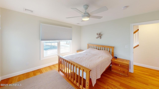 12 23rd Ave, South Seaside Park, NJ 08752 - bedroom featuring light wood-style flooring, baseboards, and ceiling fan