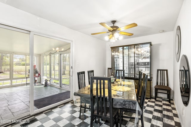 dining area with visible vents and ceiling fan