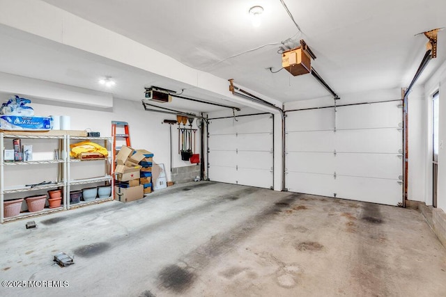 garage featuring a garage door opener