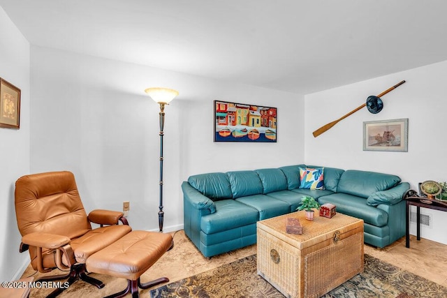living room featuring baseboards