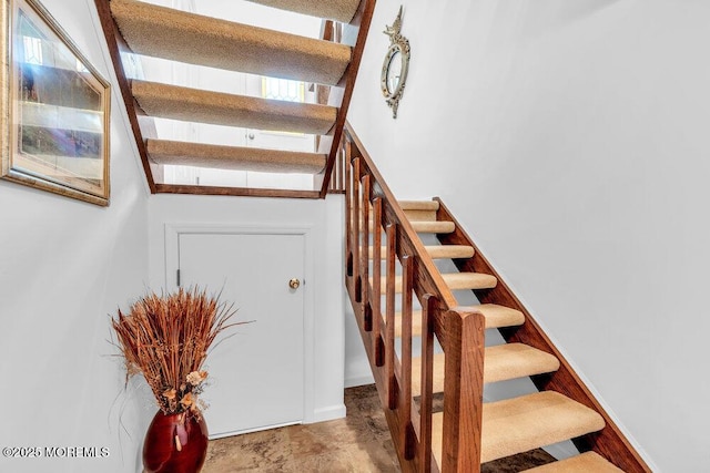 stairway with baseboards