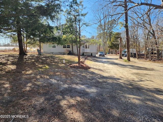 517 Newtons Corner Rd, Howell, NJ 07731 - view of front facade featuring dirt driveway and crawl space