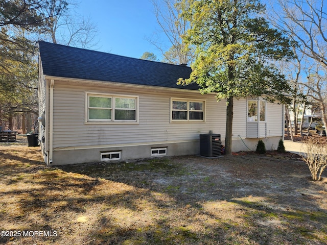 517 Newtons Corner Rd, Howell, NJ 07731 - rear view of house featuring cooling unit and a shingled roof