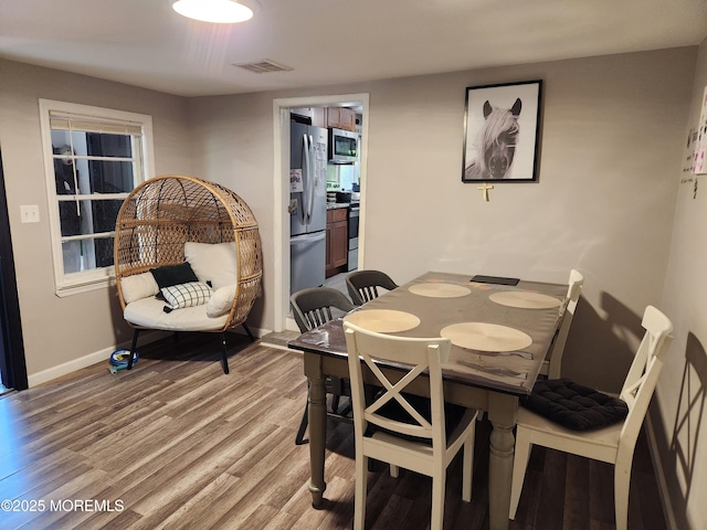 517 Newtons Corner Rd, Howell, NJ 07731 - dining room with light wood-style flooring and baseboards