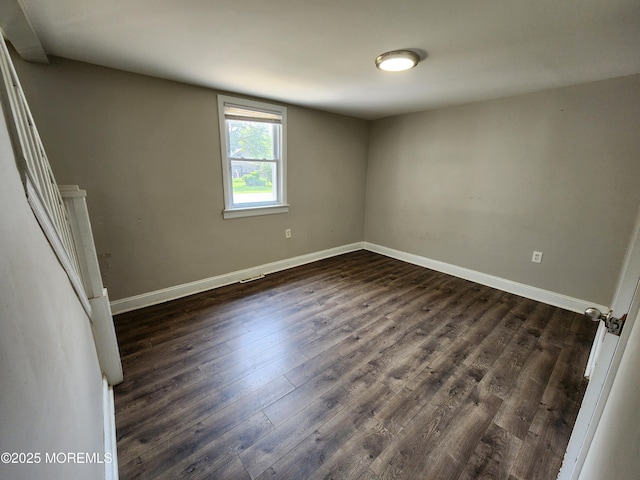 41 Willow Ave, Howell, NJ 07731 - spare room with dark wood-style flooring and baseboards
