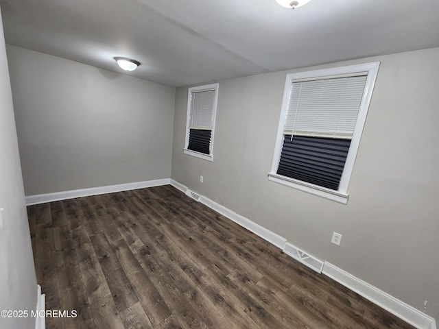 41 Willow Ave, Howell, NJ 07731 - unfurnished room featuring dark wood-style flooring and baseboards