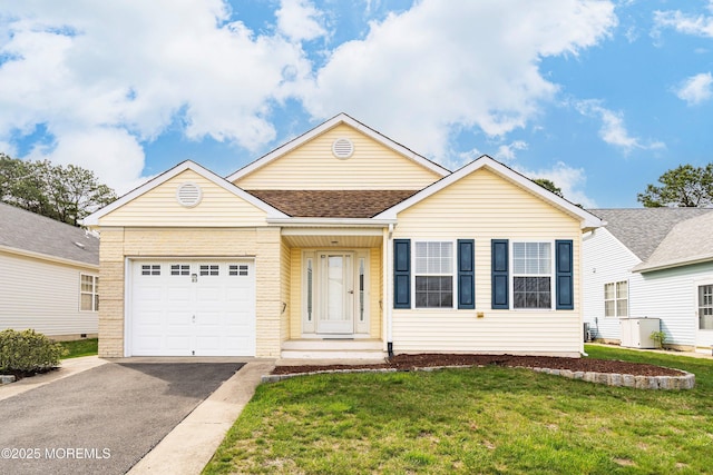 ranch-style house with a shingled roof, brick siding, a garage, a front yard, and driveway