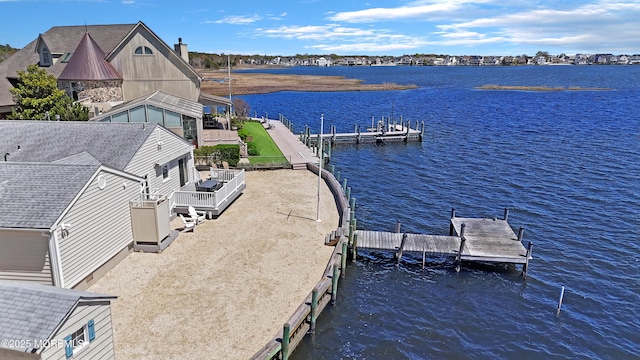 dock area featuring a water view