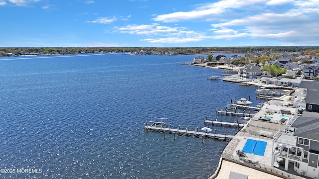 view of water feature with a boat dock