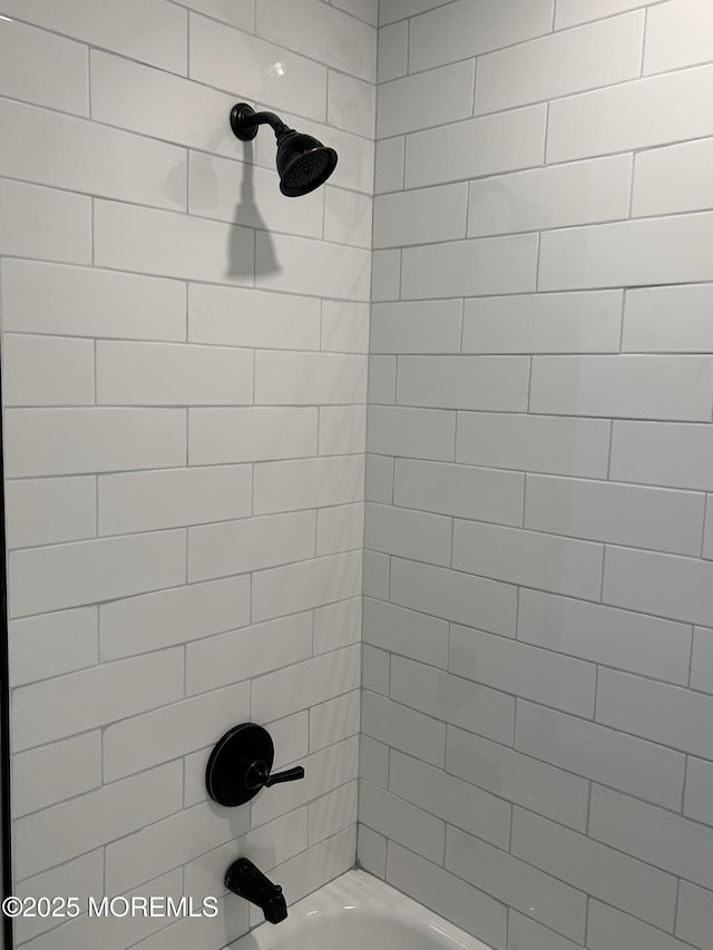 bathroom featuring shower / bath combination