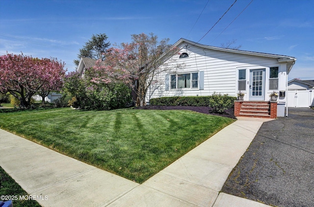 view of front of property with a front lawn