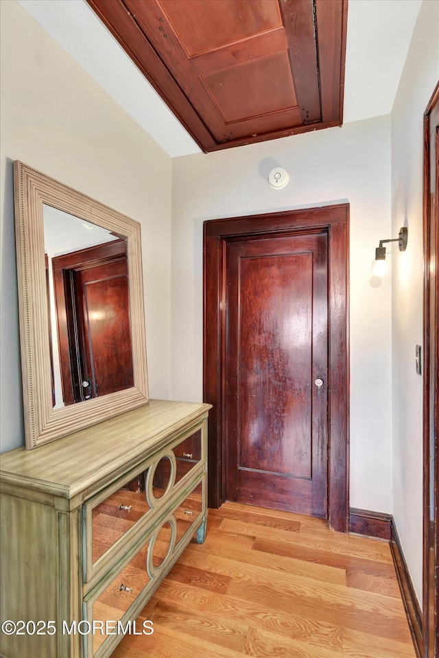 hallway featuring light wood-style flooring
