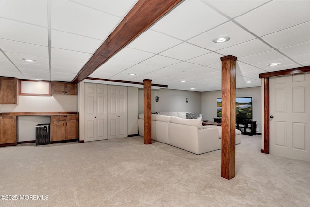 unfurnished living room with light colored carpet and recessed lighting