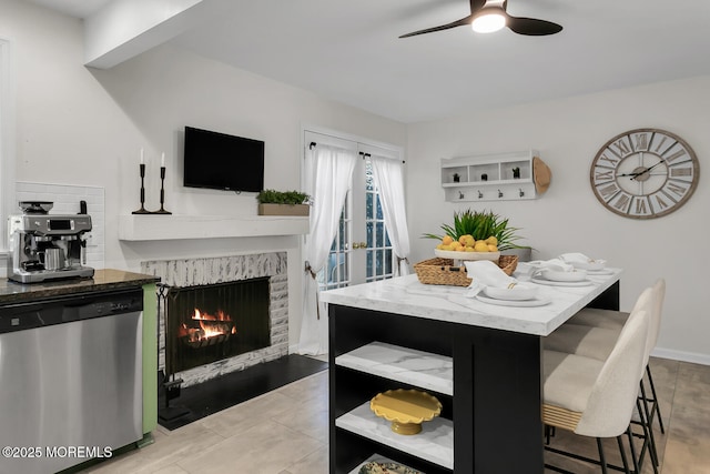 31 Mulberry Ct Unit B, Brielle, NJ 08730 - dining room featuring ceiling fan and a fireplace