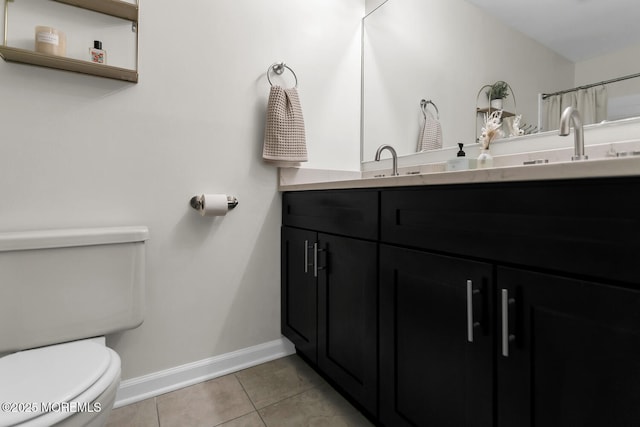 31 Mulberry Ct Unit B, Brielle, NJ 08730 - bathroom with a sink, double vanity, toilet, tile patterned floors, and baseboards